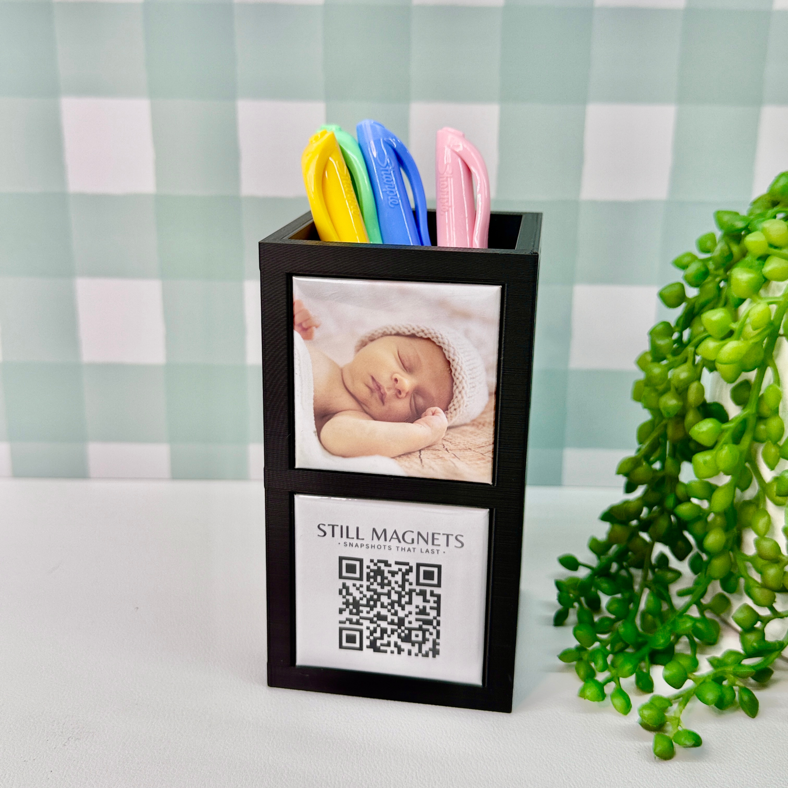 Pencil holder with photo and QR code on a checkered background