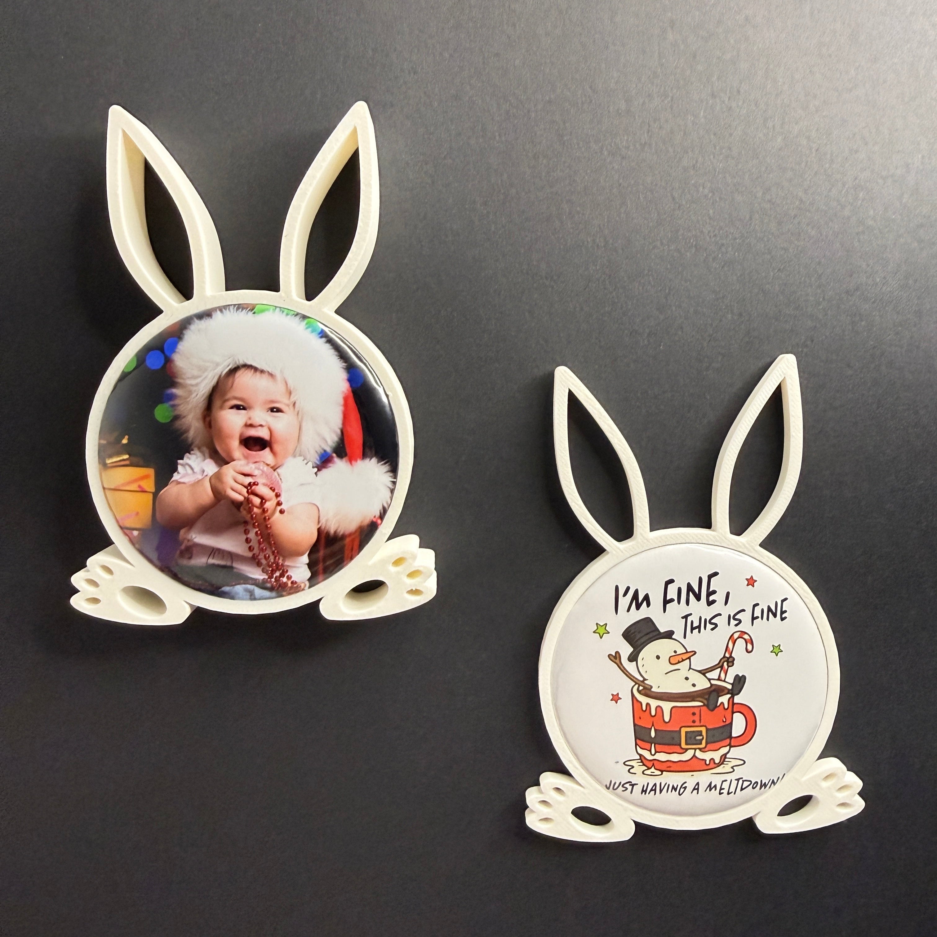 Two rabbit-shaped photo frames on a black background